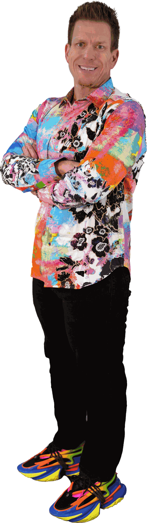 Jared Guynes standing full length in the bright floral shirt and rainbow trainers he wears on The Floor