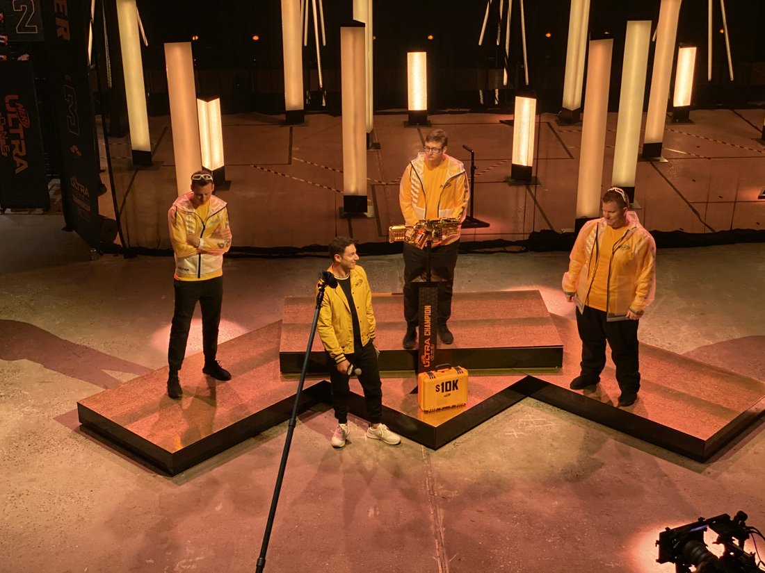 The four finalists on the lit stage at the 2019 Nerf Ultra Championship in New York