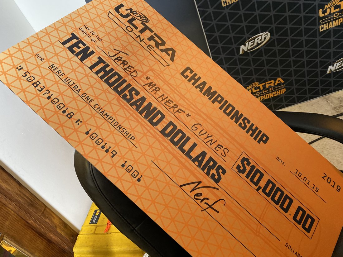 The $10,000 Nerf Ultra One Championship cheque made out to Jared "Mr Nerf" Guynes