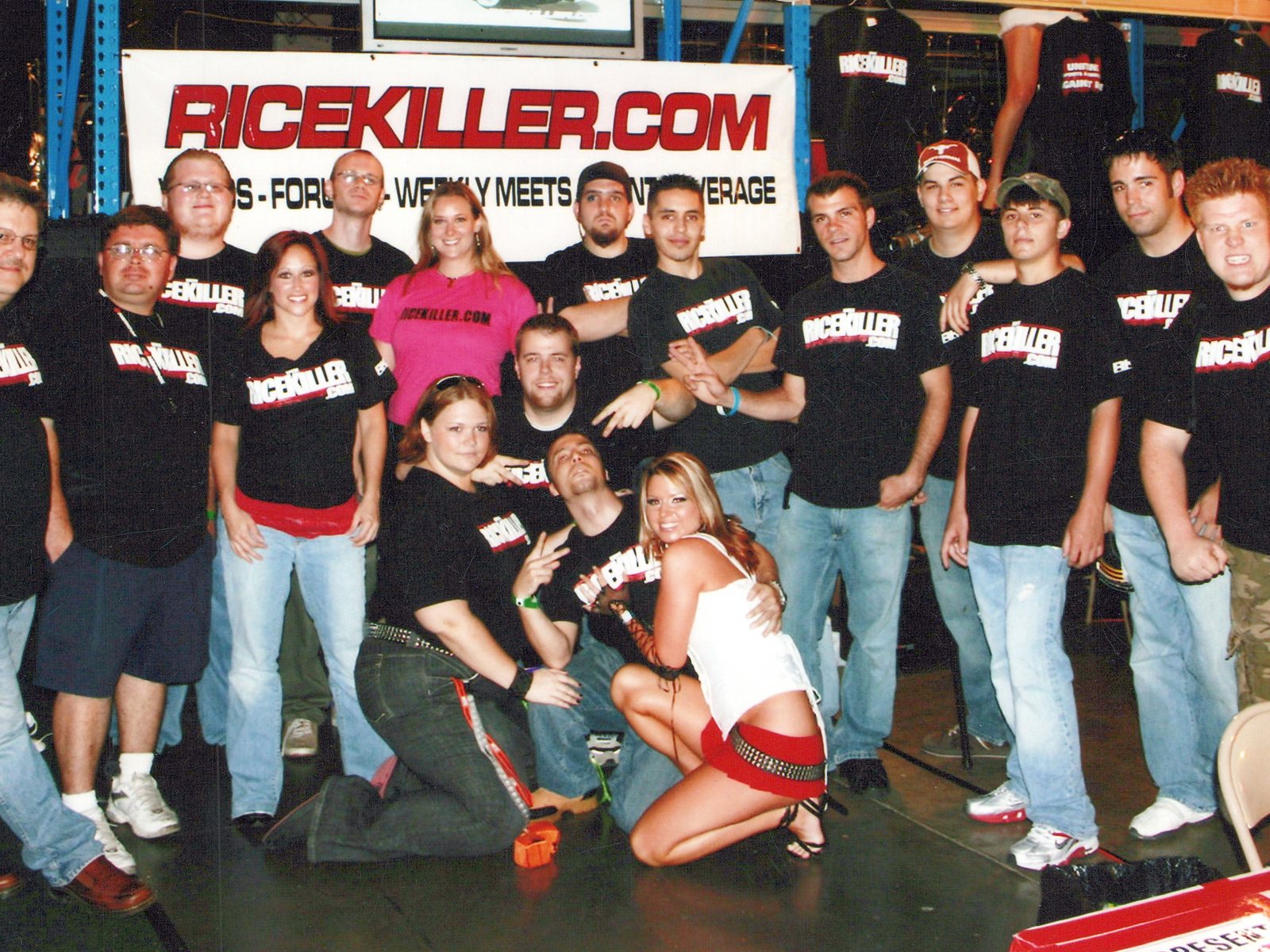 The RiceKiller.com crew in matching black shirts under a RiceKiller.com banner in 2006
