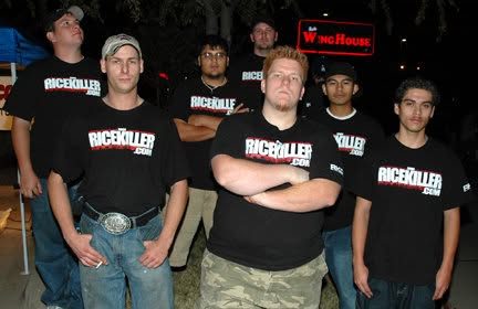 Members of the RiceKiller.com crew in matching black shirts outside at night
